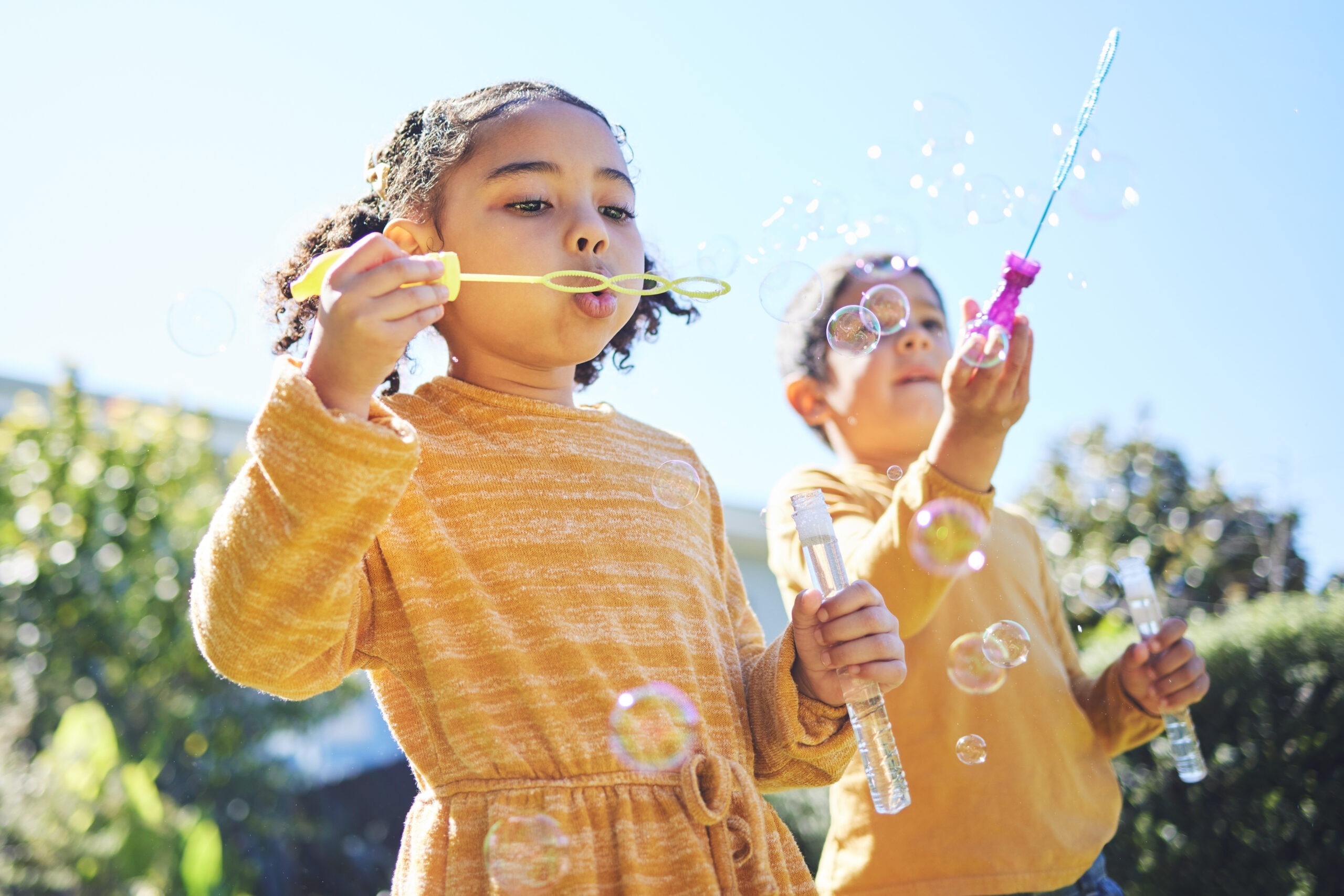 Children Playing with Bubbles