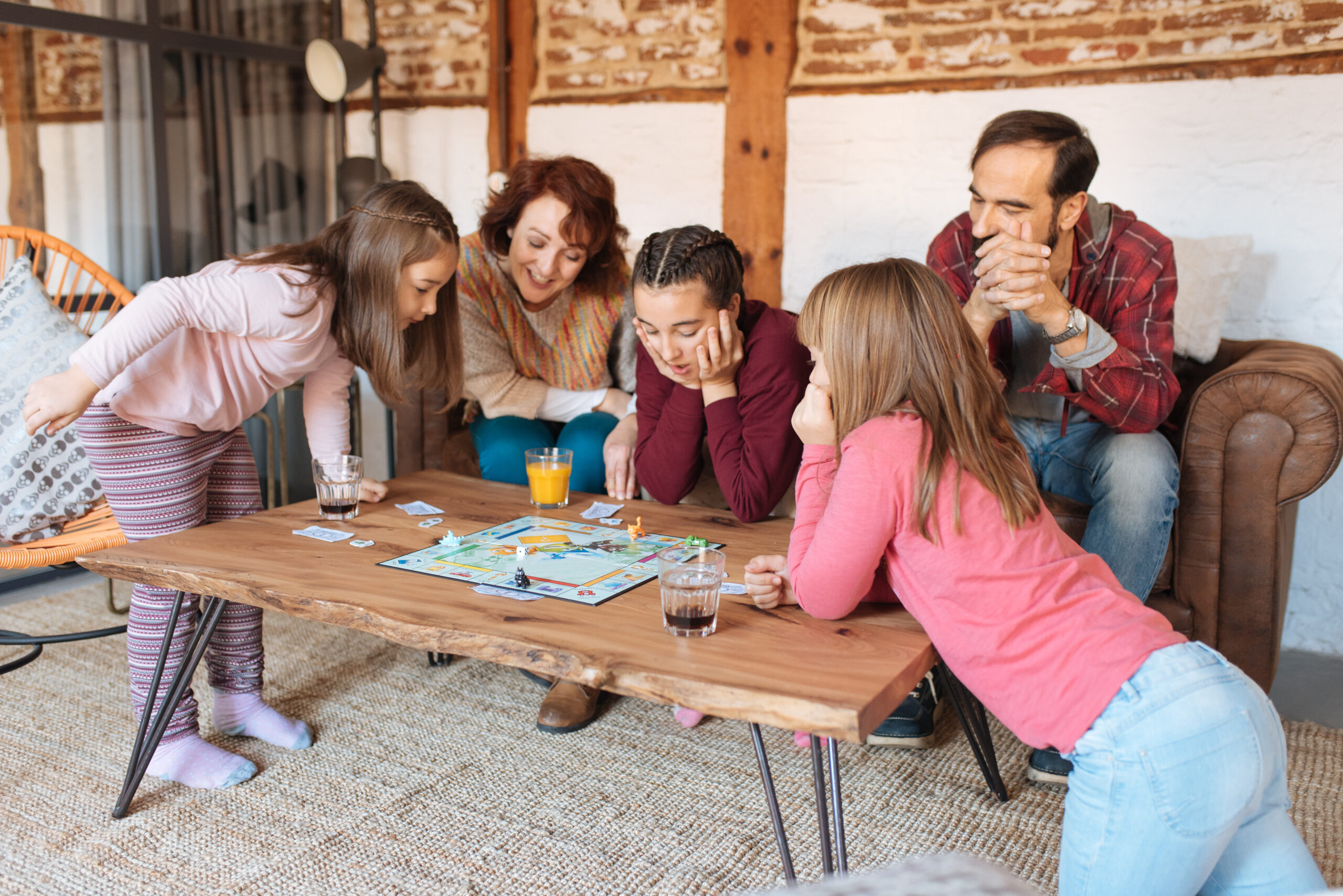 Family playing board game