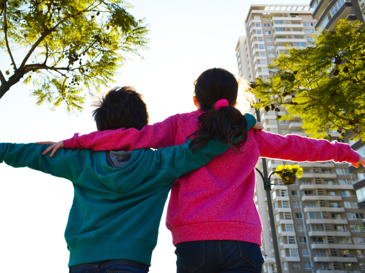 Siblings hanging outside